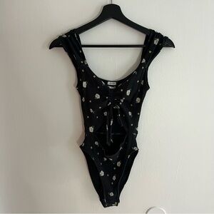 Out From Under black cut out bodysuit with daisy flowers